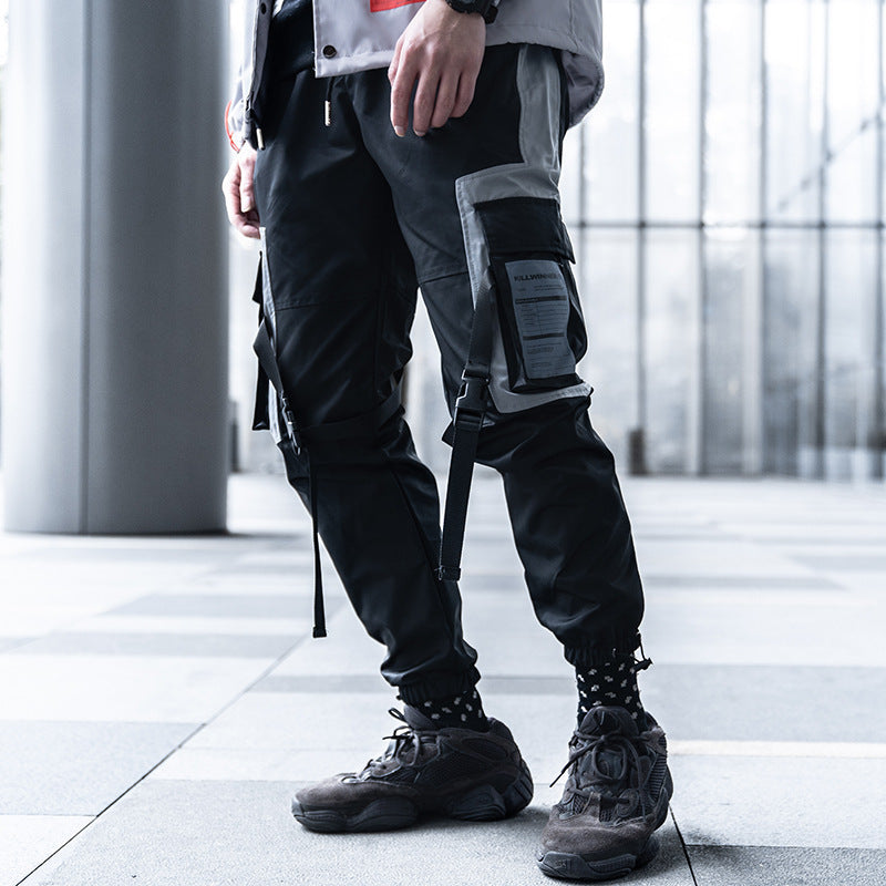 Men's tactical jogger pants, multi-pocket pants, urban streetwear joggers, outdoor pants for men, stylish joggers with straps, durable casual pants, modern men's fashion, adjustable jogger pants