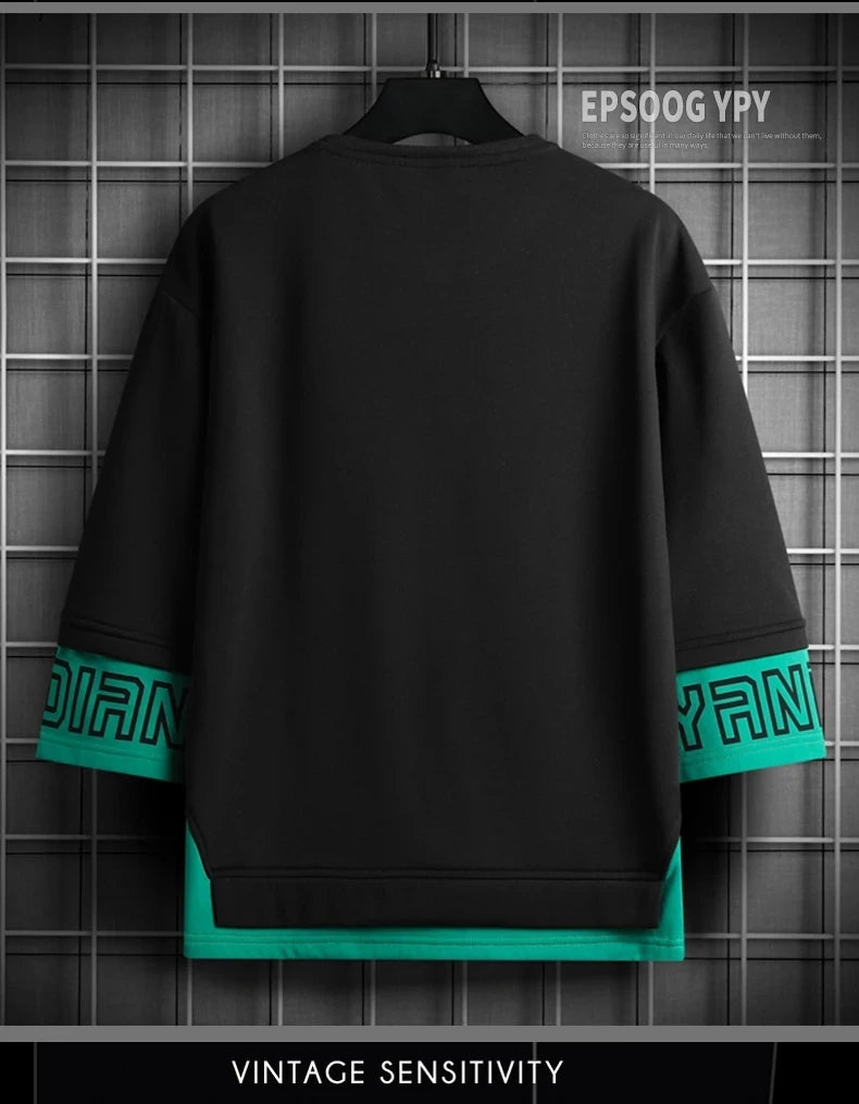 Trendy Oversized Black T-Shirt with Green Graphic Sleeves – Streetwear Essential