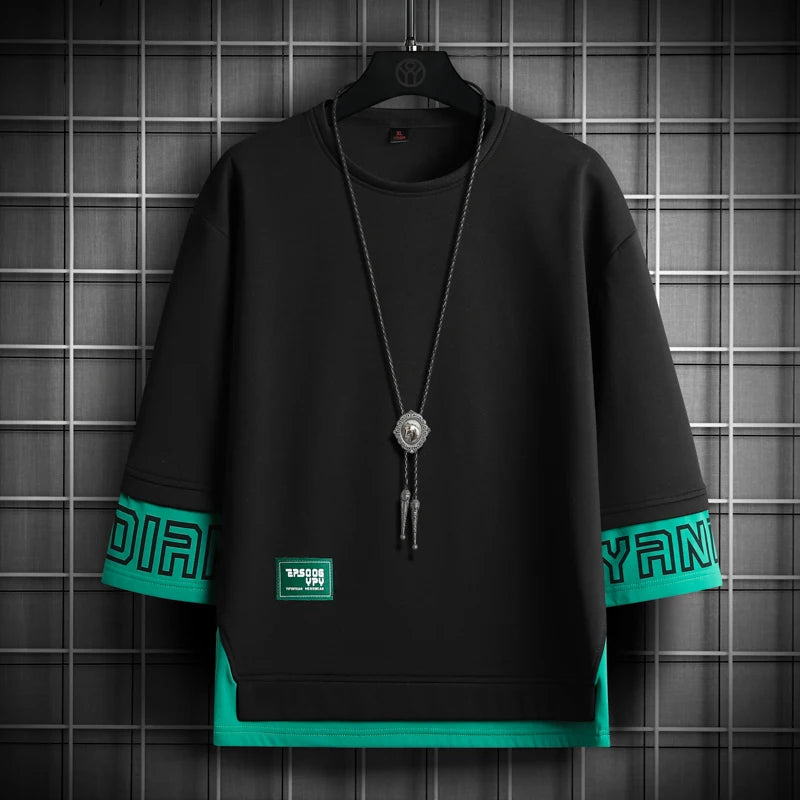 Trendy Oversized Black T-Shirt with Green Graphic Sleeves – Streetwear Essential